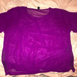 Blouse with decorative zippers on the sides